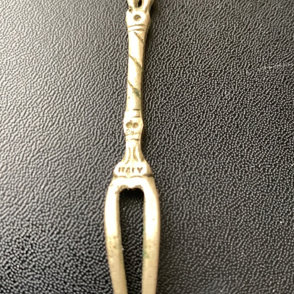 Sterling silver hors d’oeuvre mini fork.